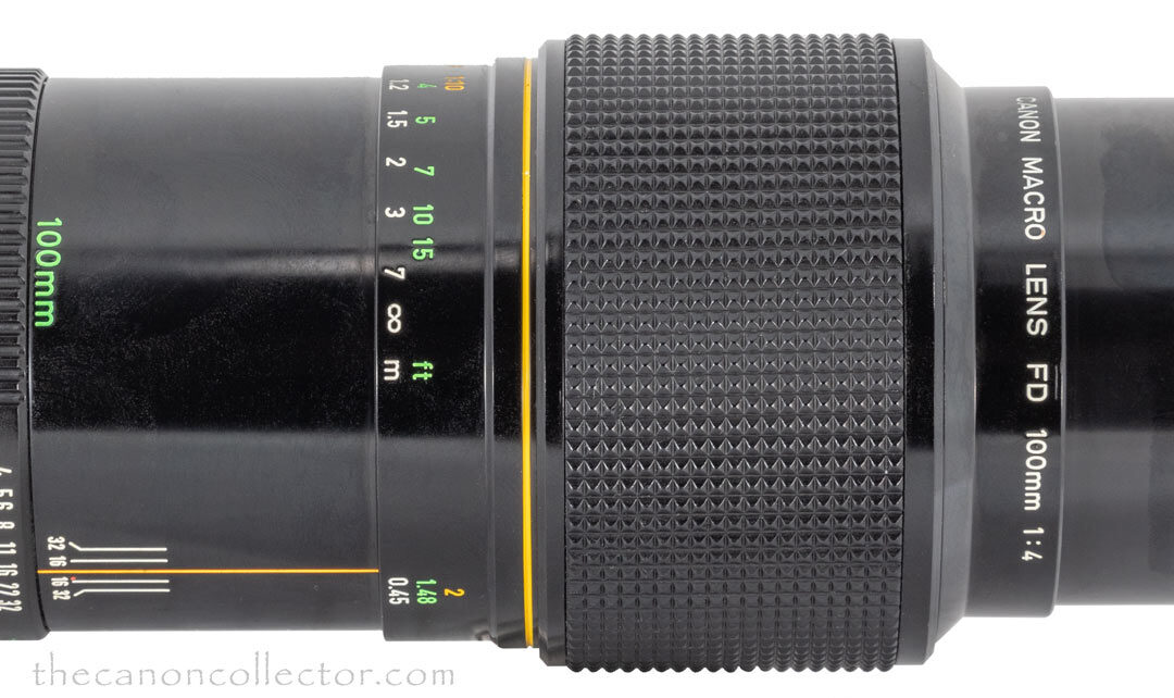 Canon FDn 100mm 1:4 Macro-Side-Open-w-Yellow